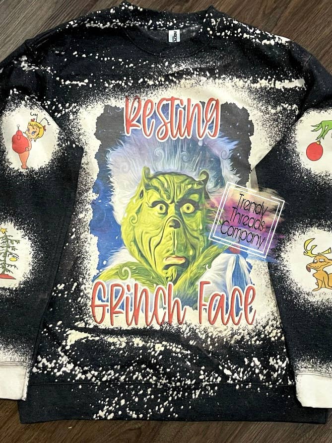 Hvile Grinch Ansigt Sweatshirt for engroshandel hos Trendy Threads Designs LLC
