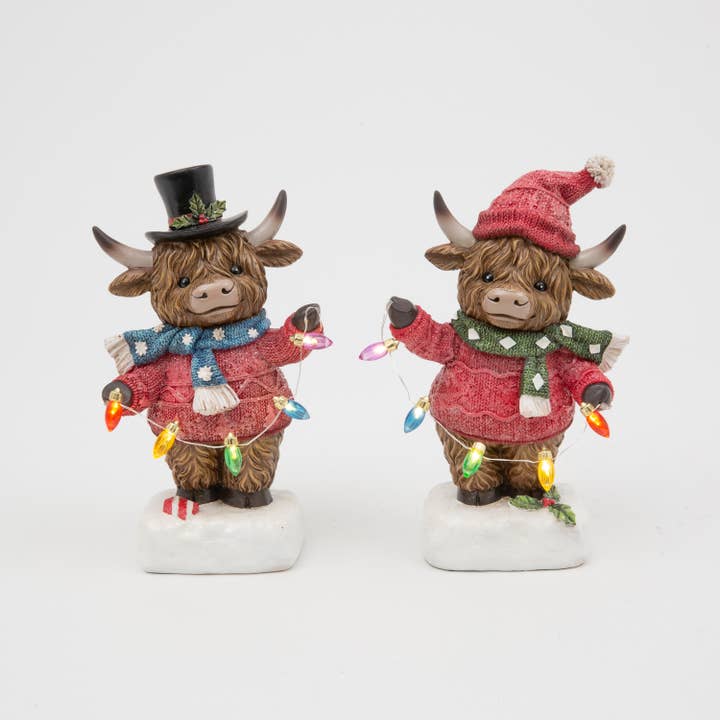 The Gerson Companies - Wholesale Christmas Decoration - Gerson Christmas 8.8"H B/O Lighted Resin Holiday Highland Co1