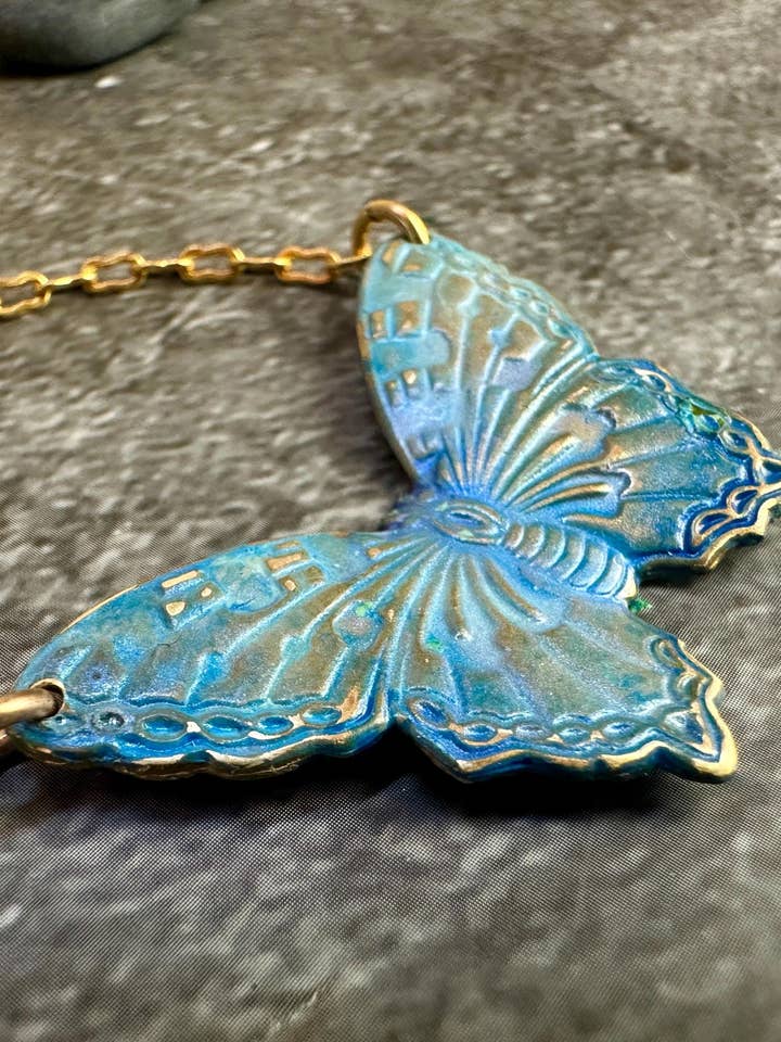 Enchanting Iridescent Butterfly Necklace - Handcrafted Brass for wholesale by The Sunstone on Main