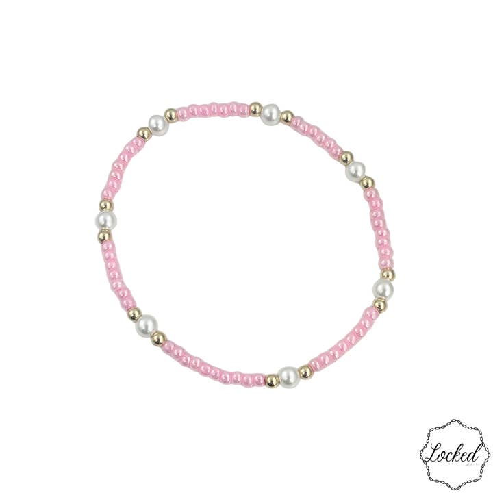 Bracelet en perles rempli d'or rose et perle pour la vente par Locked by Lula 'n' Lee