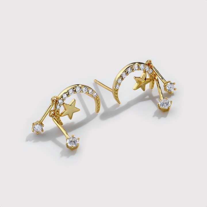 Dainty Gold Star Moon Drop Earrings in 925 Sterling Silver for wholesale by Perimade & Co. LLC