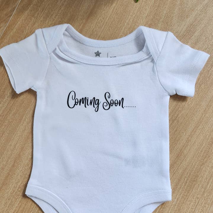 'Coming soon' baby onesie (short-sleeve) for wholesale by Binnie Baby