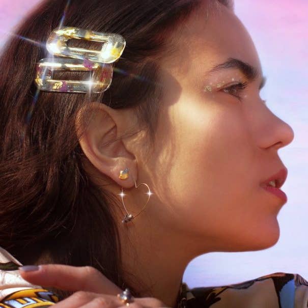 LOV Ohrringe mit Campo Del Cielo Meteorit und vergoldetem Herz-Kreis für den Großhandel von Météôrys