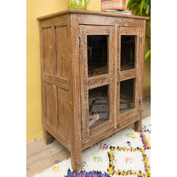 Namaste – wholesale Cabinet – Distressed Wood & Glazed Door Cabinet With Central Shelf