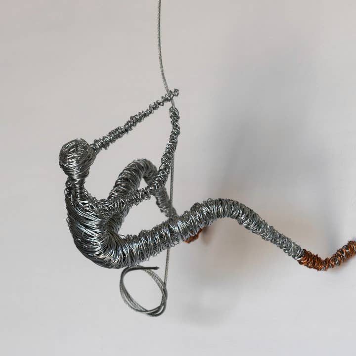 Man Wire Sculpture Climber with Copper Shoes for wholesale by Haritopoulou