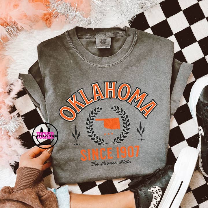 OKLAHOMA VINTAGE VARSITY TEE - COMFORT COLORS PEPPER for wholesale by Tucker with a Tee