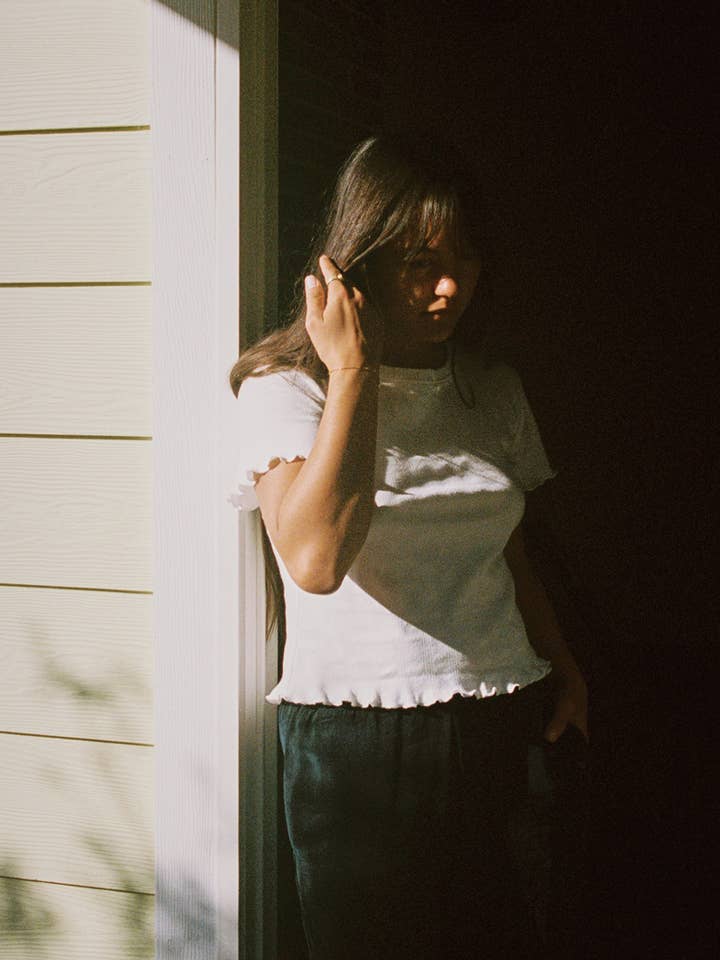 White Pointelle Flutter Tee for wholesale on Faire