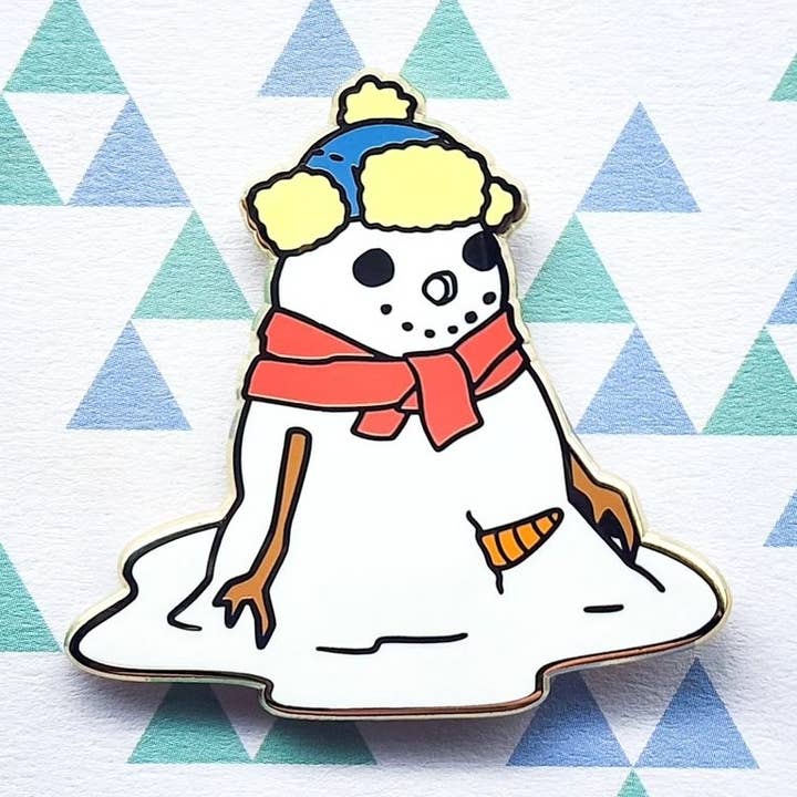Suspiscious Snowman Enamel Pin for wholesale by Toku Arts