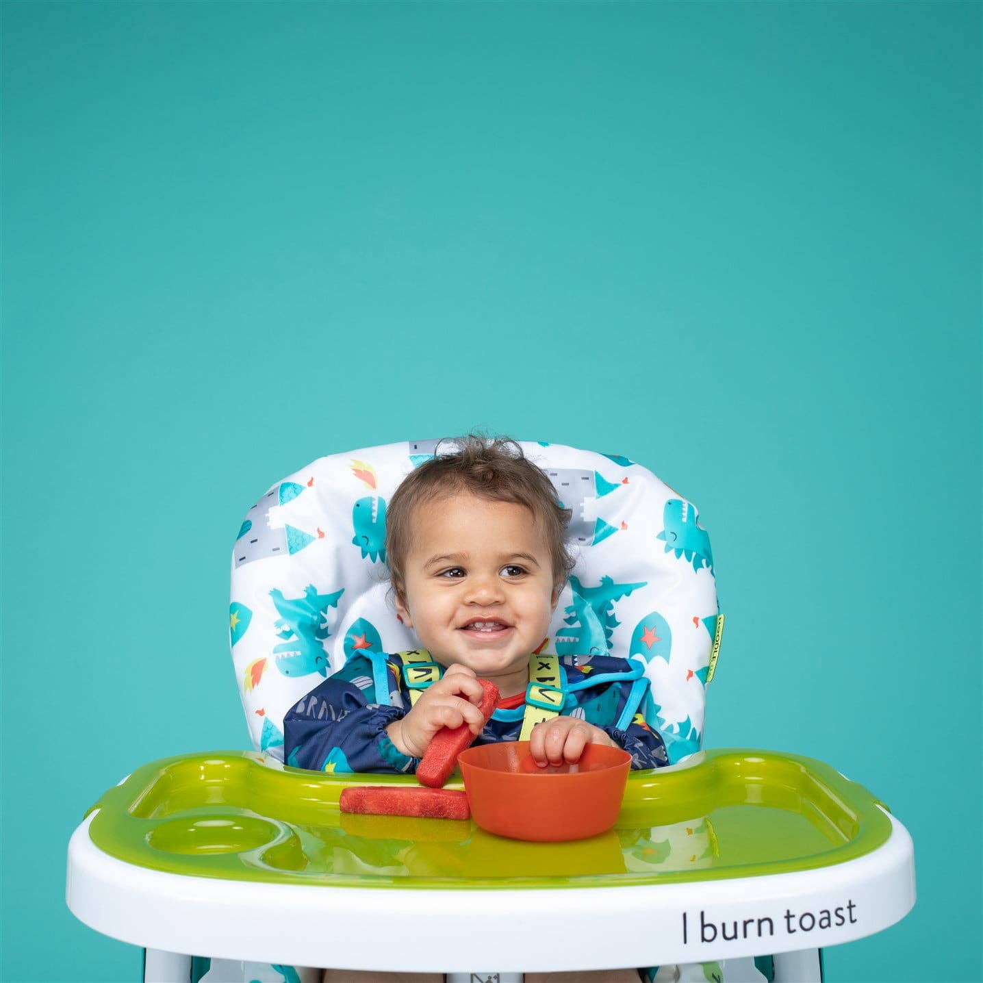 Blue Cosatto Coverall Feeding Bib Dragon Kingdom for wholesale on Faire1