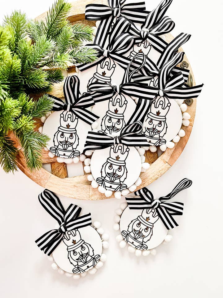 Nutcracker with Pompom Fringe for wholesale by Mae Designs LLC