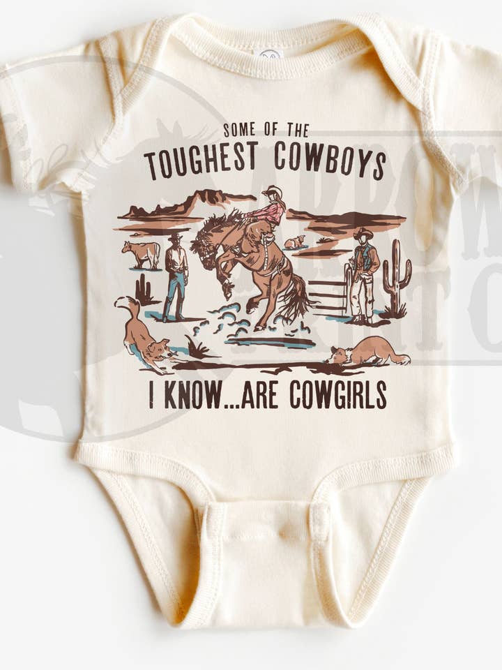 Toughest Cowgirl S/S Onesie or Tee for wholesale by The Fringed Pineapple