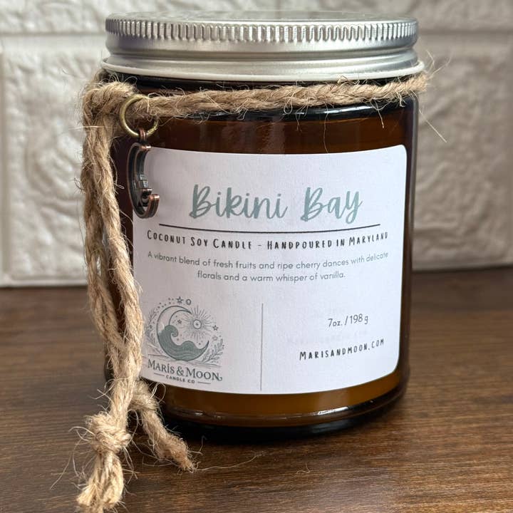 Bikini Bay 7oz candle amber glass calming crystal infused for wholesale by Maris & Moon Candle Co.