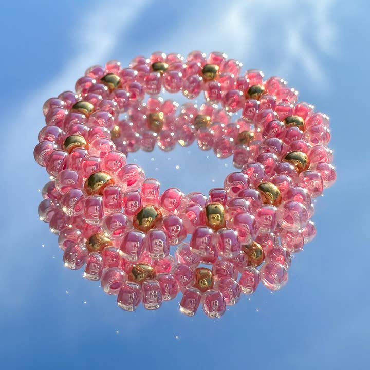 Anel de flores "Lilly" de missangas em rosa por atacado de cool people club