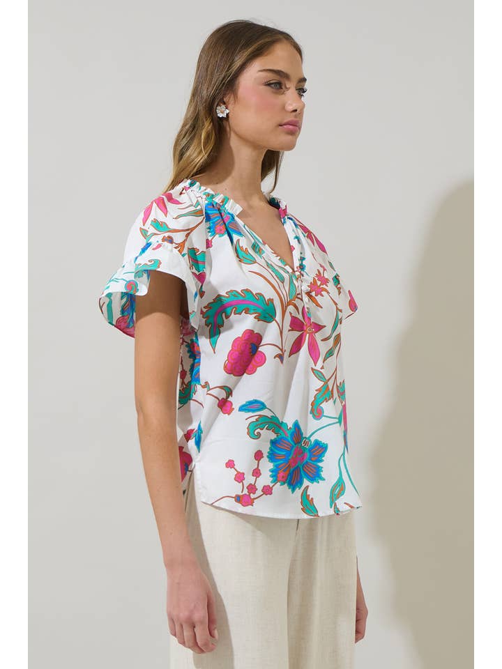 WhiteFuschia Izzie Floral Macy Ruffle Top for wholesale on Faire