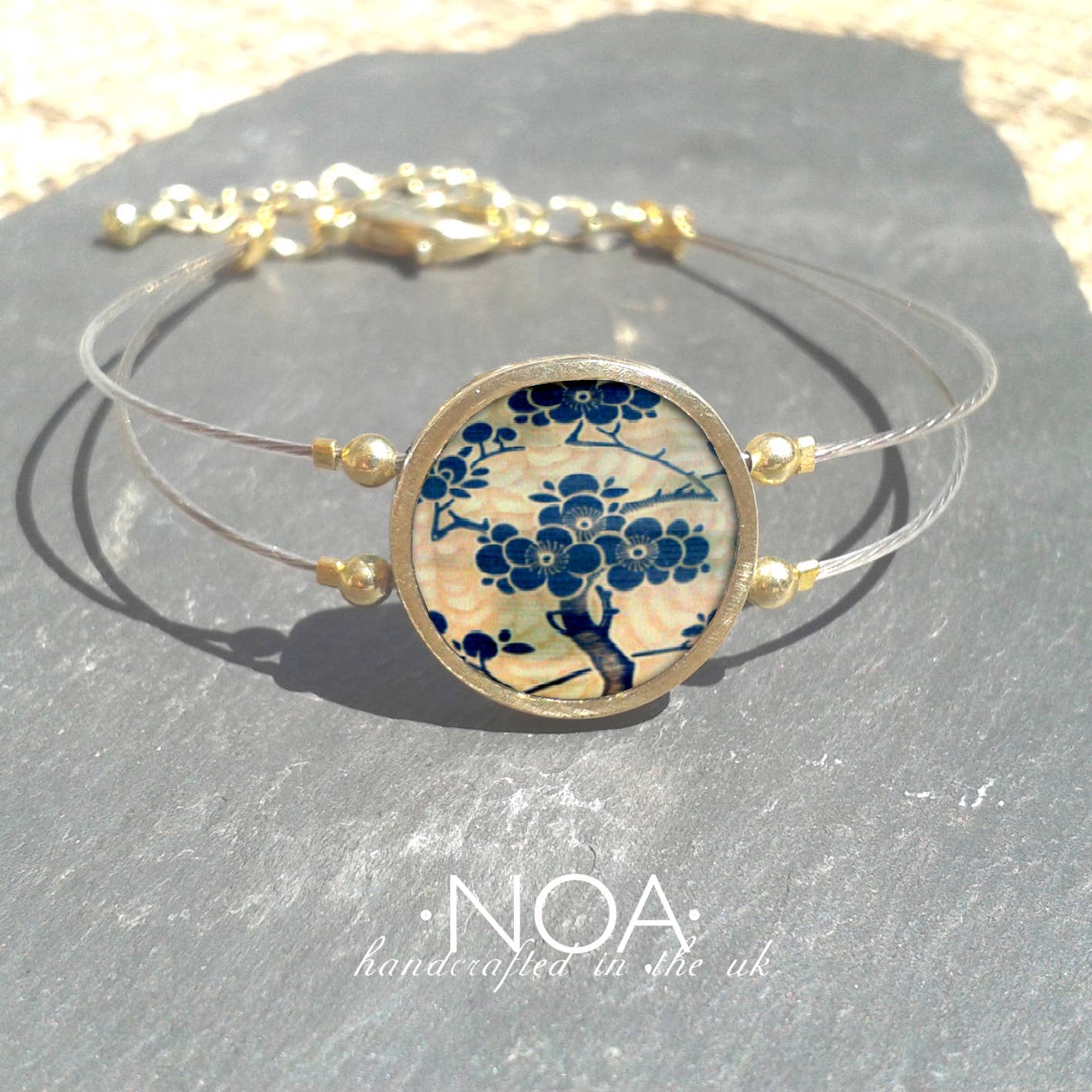 Noa Jewellery – wholesale Charm/dangle bracelet – Round Ceramic Bracelet, Gold Plated Stainless Steel Frame6