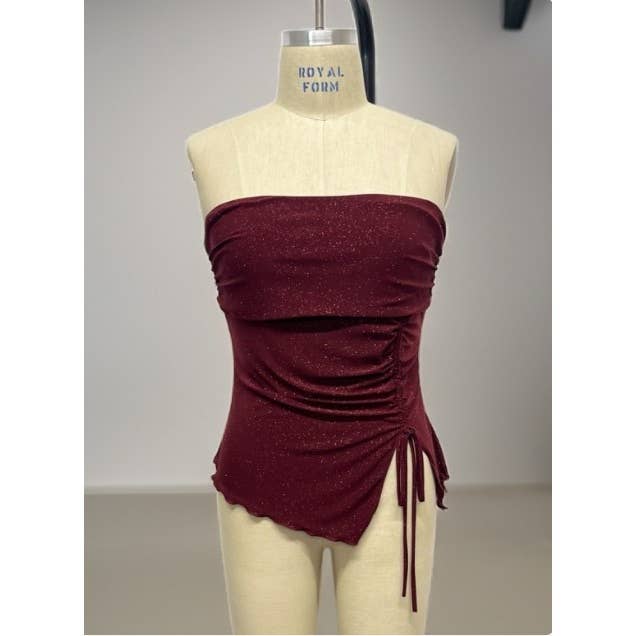 Glittrig tubtopp i plusstorlek med rynkad sida och asymmetrisk fåll för wholesale av Curve Market