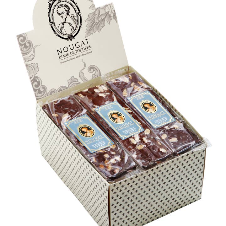 Nougat Diane De Poytiers - Vendita all'ingrosso Torrone - Barretta di torrone al cioccolato con cacao e scorza d'arancia 100 g in esposizione1