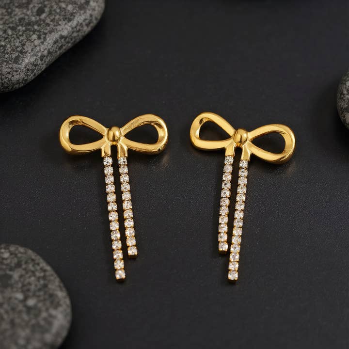 Revelari - Wholesale Dangle earrings - Stainless Steel Bow Drop Earrings with Rhinestone Chains