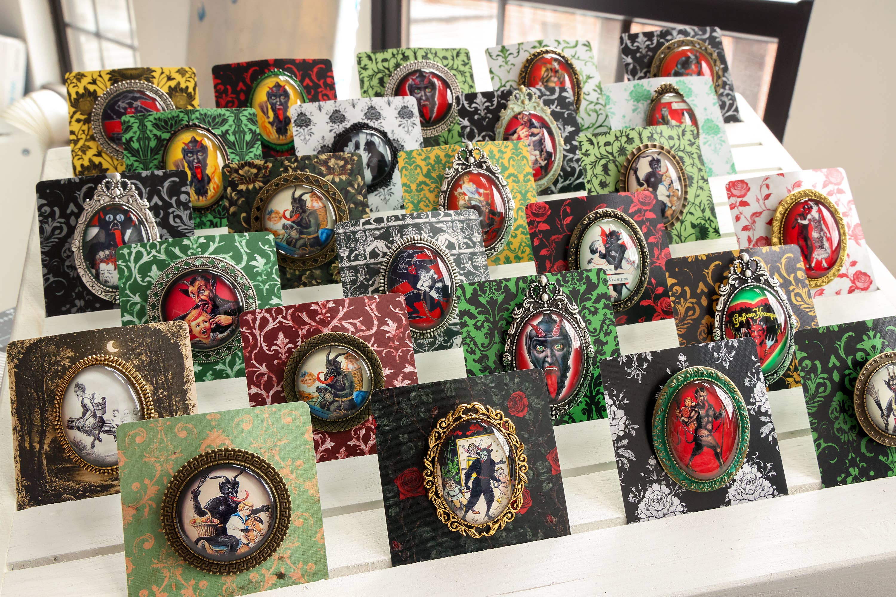 Asunder Bazaar - Wholesale Brooch - 20pc Krampus Brooches on Cards10