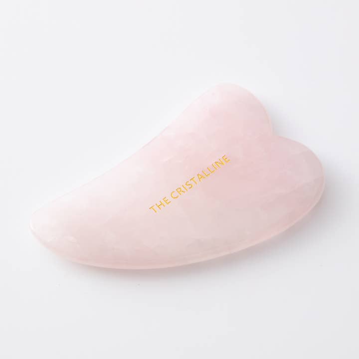 Rose Quartz Heart Gua Sha Tool for wholesale by THE CRISTALLINE