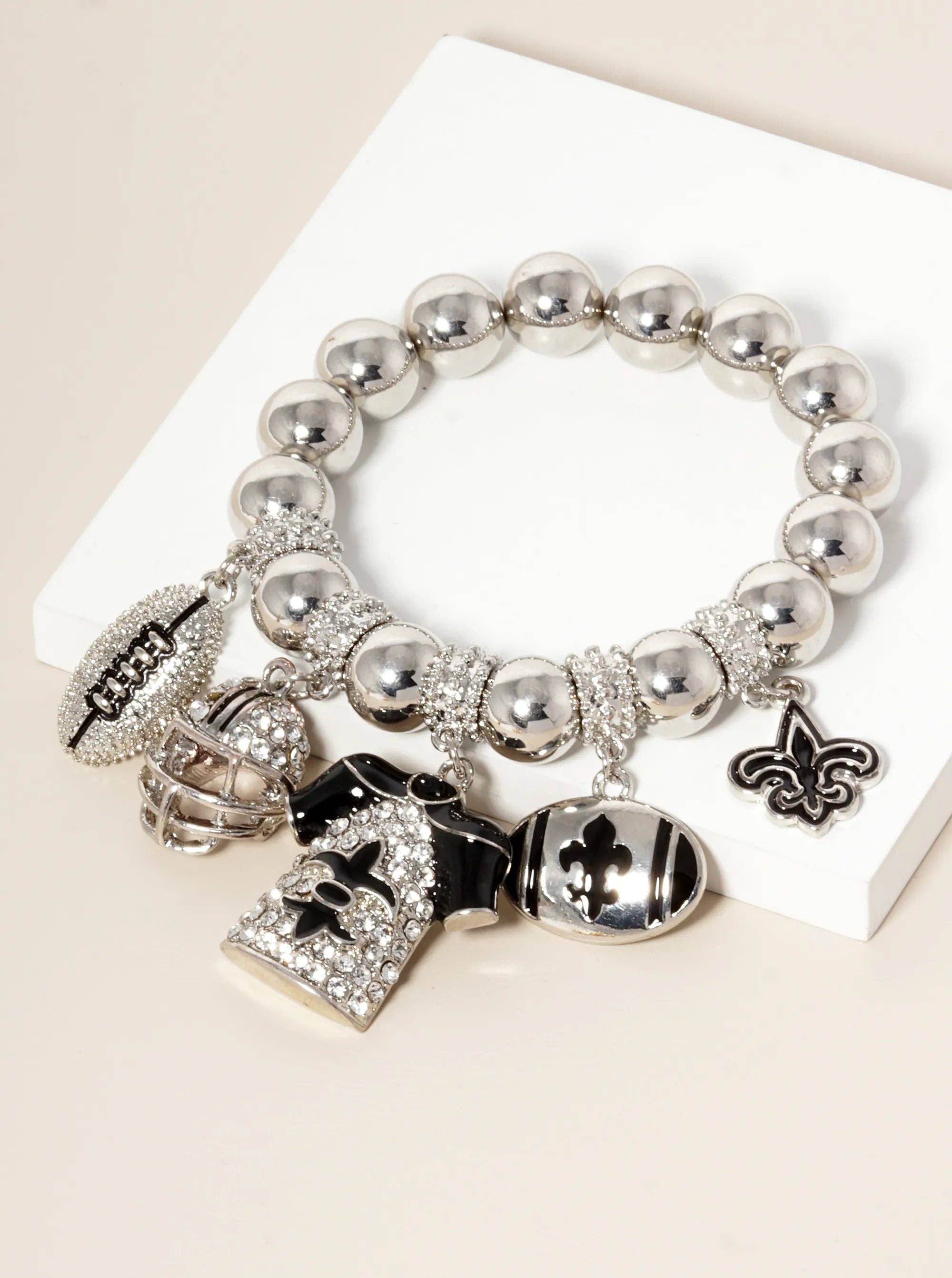 Wild Honey - Wholesale Charm/Dangle Bracelet - New Orleans Saints Fleur De Lis Rhinestone Football Bracelet0