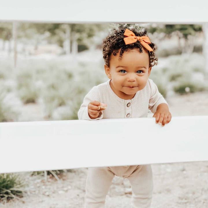 Cedar Orange Hair Bow for wholesale by Roses and Polkadots Boutique