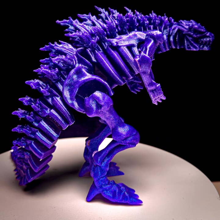 Fully Articulated Skeletonized Godzilla Purple Nebula Vibrant Galaxy Figure | Posable Handmade Titan Toy | Skeleton Kaiju Monster Dragon for wholesale by August Art House