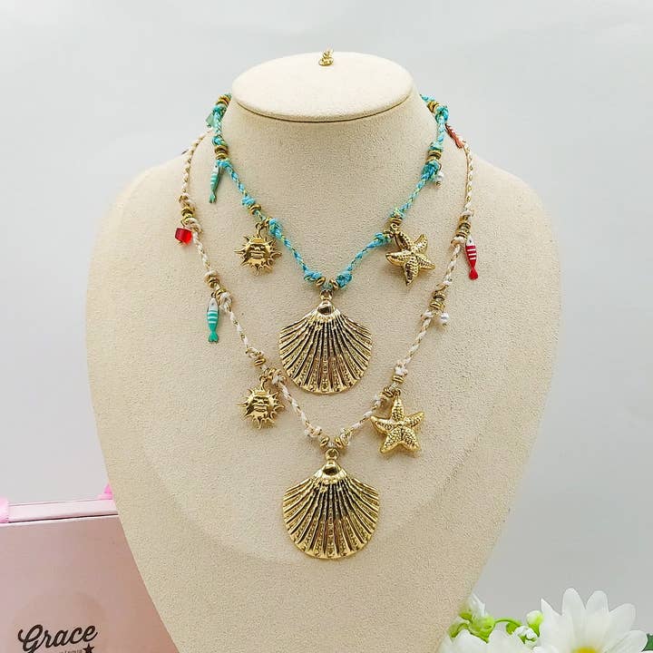 SHELL COLLANA - ACCIAIO inossidabile - Collana intrecciata con conchiglia e pietre dure and other Purchase Wholesale pietre dure. Free Returns & Net 60 Terms on Faire trending on Faire.