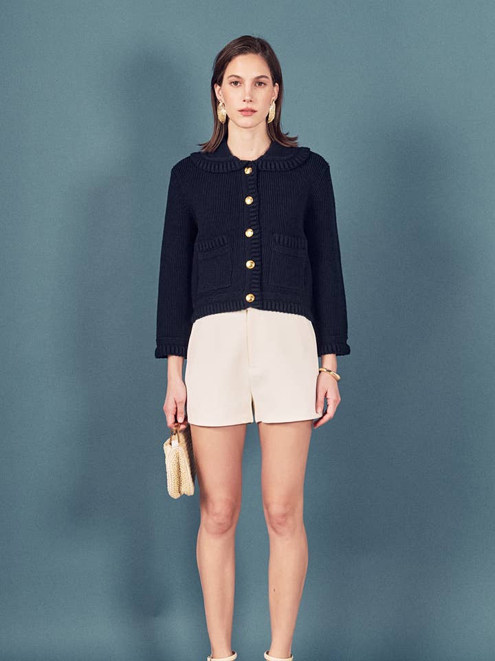 Cardigan en maille avec détail tressé pour la vente par English Factory