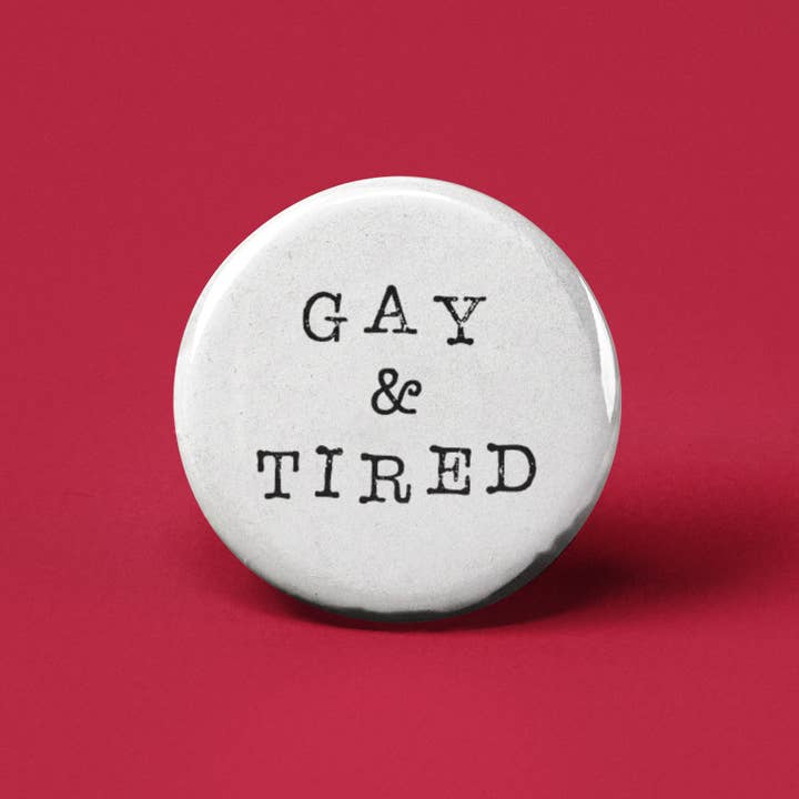 Gay and Tired Pinback Button for wholesale by The Pin Pal Club