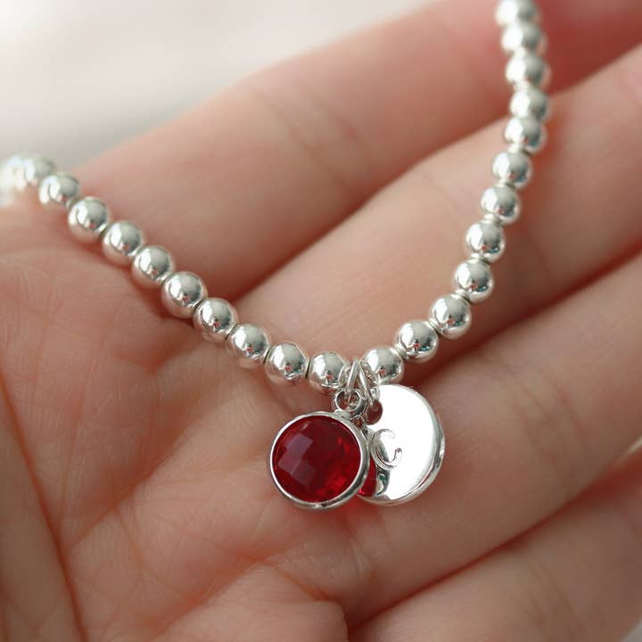 Personalised Birthstone Bracelet for Sister, Card Jewellery in the Box, Sentimental Silver Stretch Charm Bracelet, Birthday Gift for Sister for wholesale by SYMBOLOGY JEWELLERY