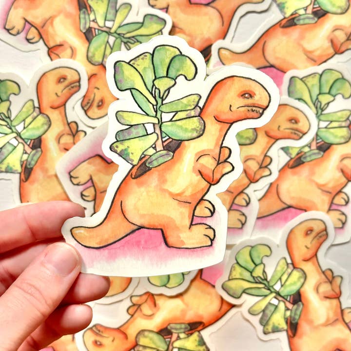 Orange Dino Vinyl Sticker for wholesale by Fiber & Brimstone