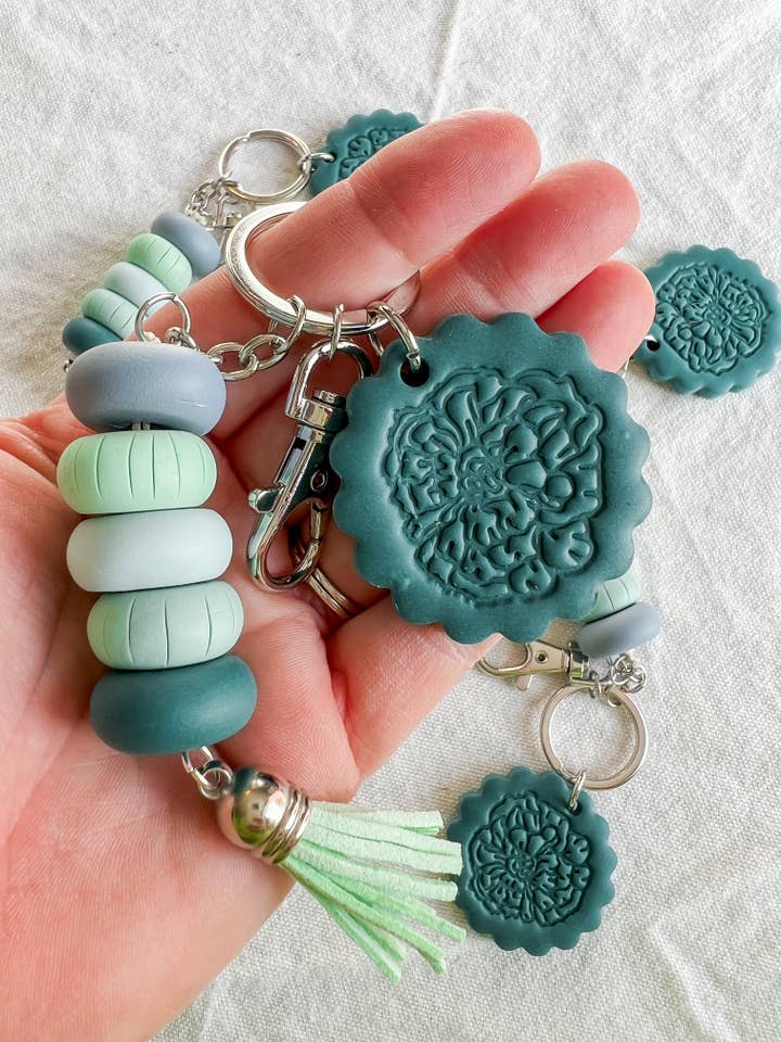 Turquoise and Blue Beaded Magnolia Stamp Clay Keychain for wholesale by Morning Dew Designs
