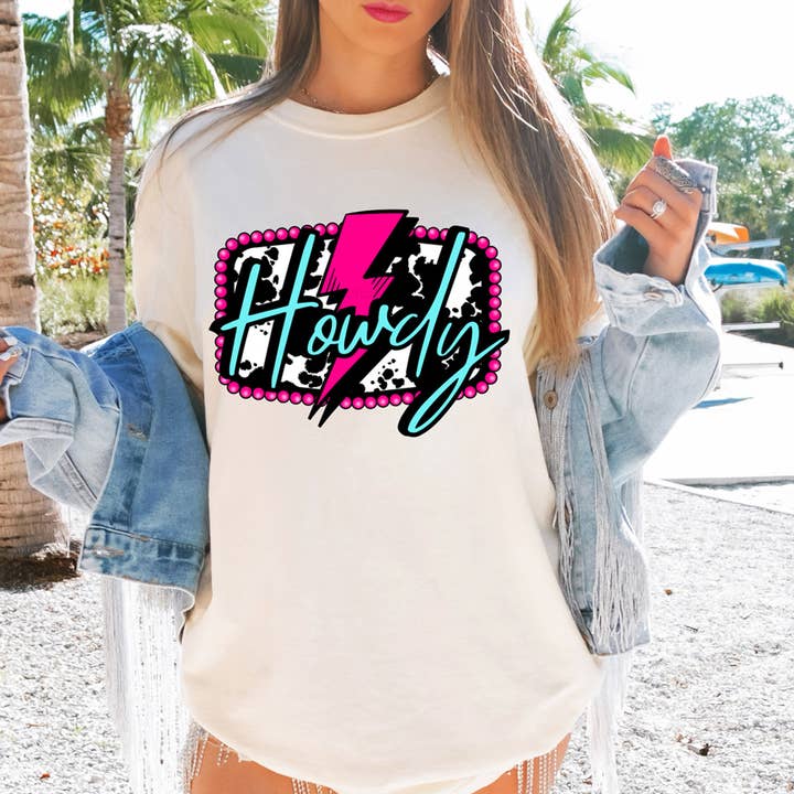 Cow Print Howdy Lightning Bolt DTF Heat Transfer for wholesale by Trendy Transfers