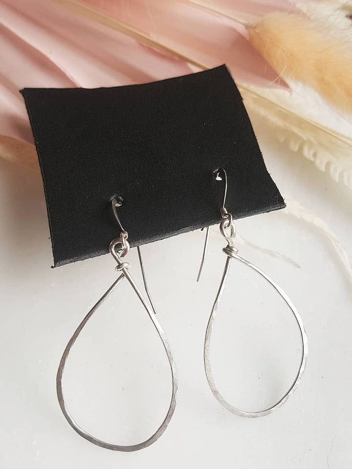Sterling Silver Hammered Teardrop Hoop earrings for wholesale by Ladyfine Collective