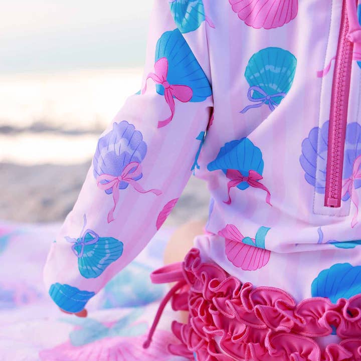 Long Sleeve Rash Guard With Ruffle Bottom | Seaside Sweetie for wholesale by Caden Lane