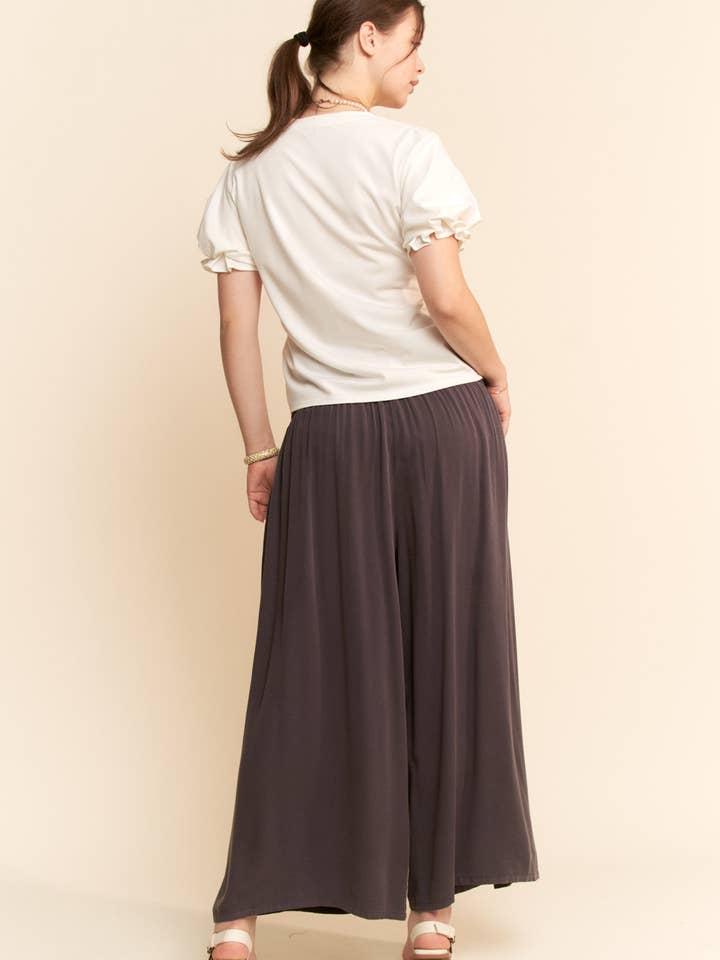 Charcoal PEACE AND STAR PATCHWORK LEG PANTS for wholesale on Faire6