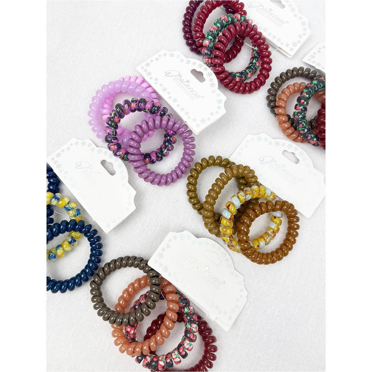Print and Solid Mix Multi Design Spiral Hair Ties for wholesale on Faire3