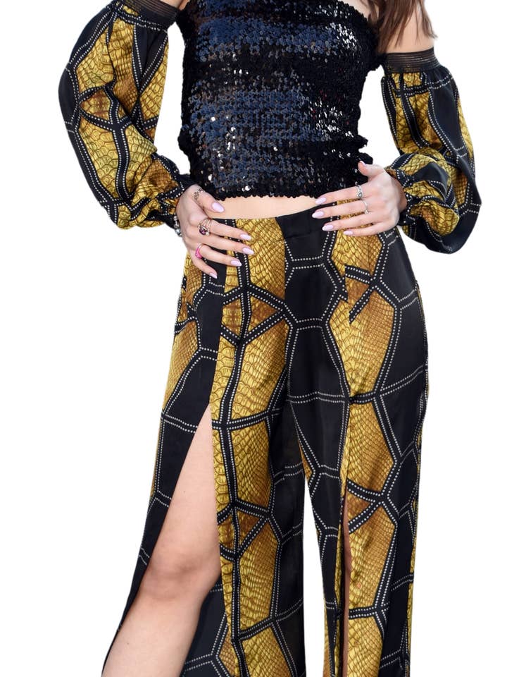 Atuendos negros y dorados para venta al por mayor de Scalzi & Pareati