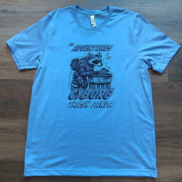 The Adventures of the Cyborg Trash Panda Graphic Tee for wholesale by Haack Shack