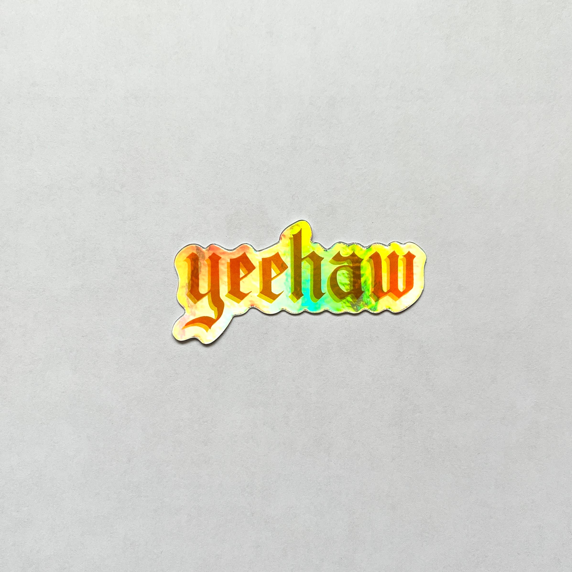Kirsten Bauer - Wholesale Sticker - Yeehaw Orange Holographic Sticker1