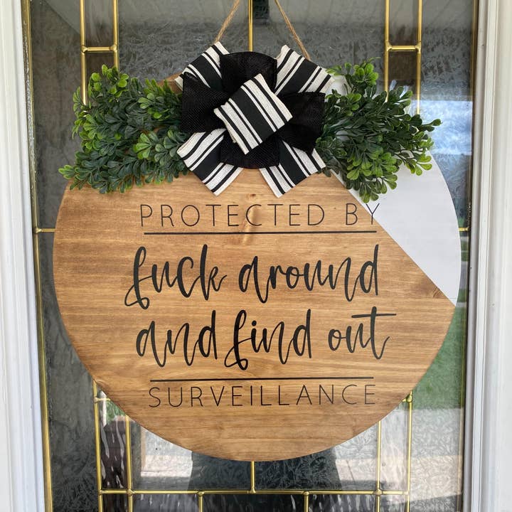 Fuck Around Surveillance Door Hanger for wholesale by Timbered Roots Co