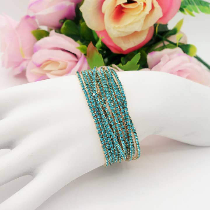 TURCHESE base ORO SELMA set - 12 bracciali elasticizzati in cubic zirconia for wholesale on Faire1
