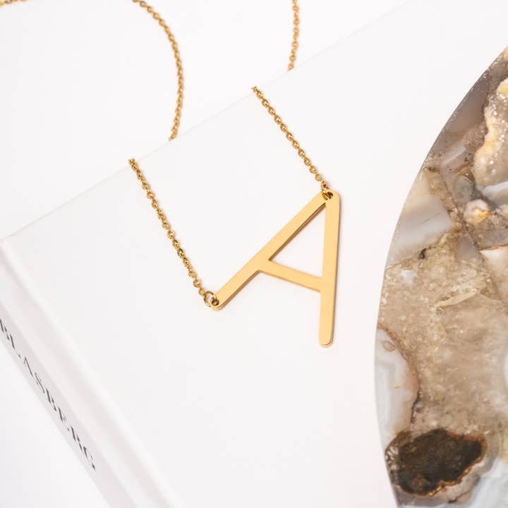A GOLD INITIAL PENDANT NECKLACE for wholesale on Faire1