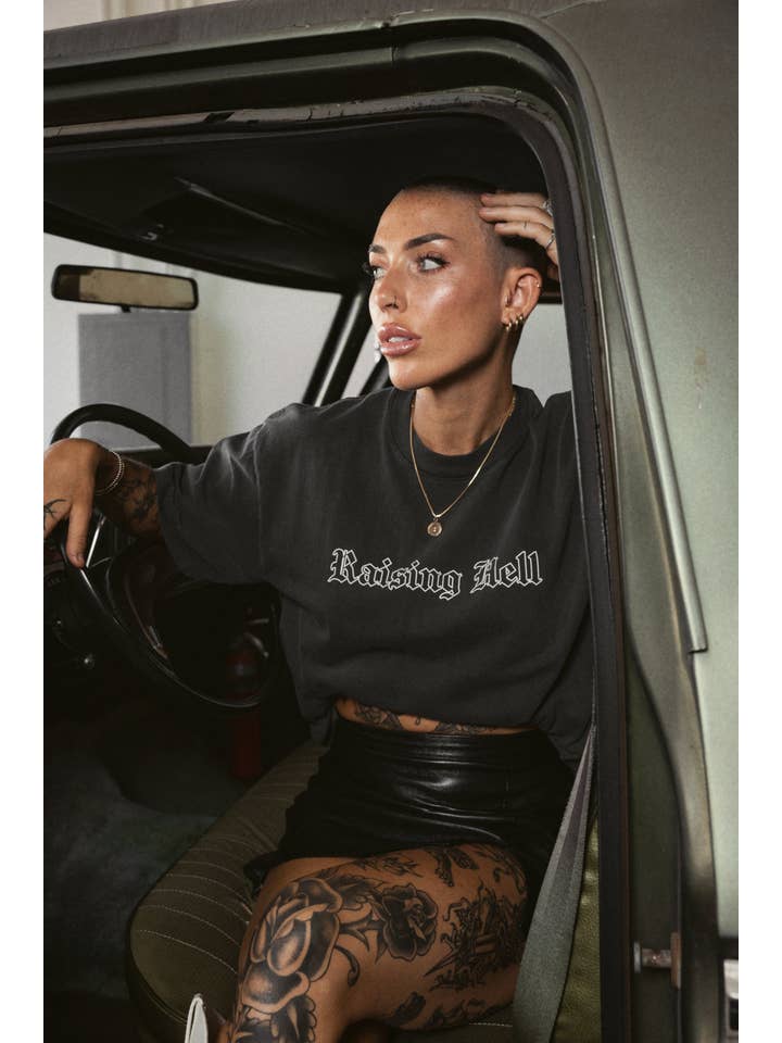 Washed Black Raising Hell Tee for wholesale on Faire3