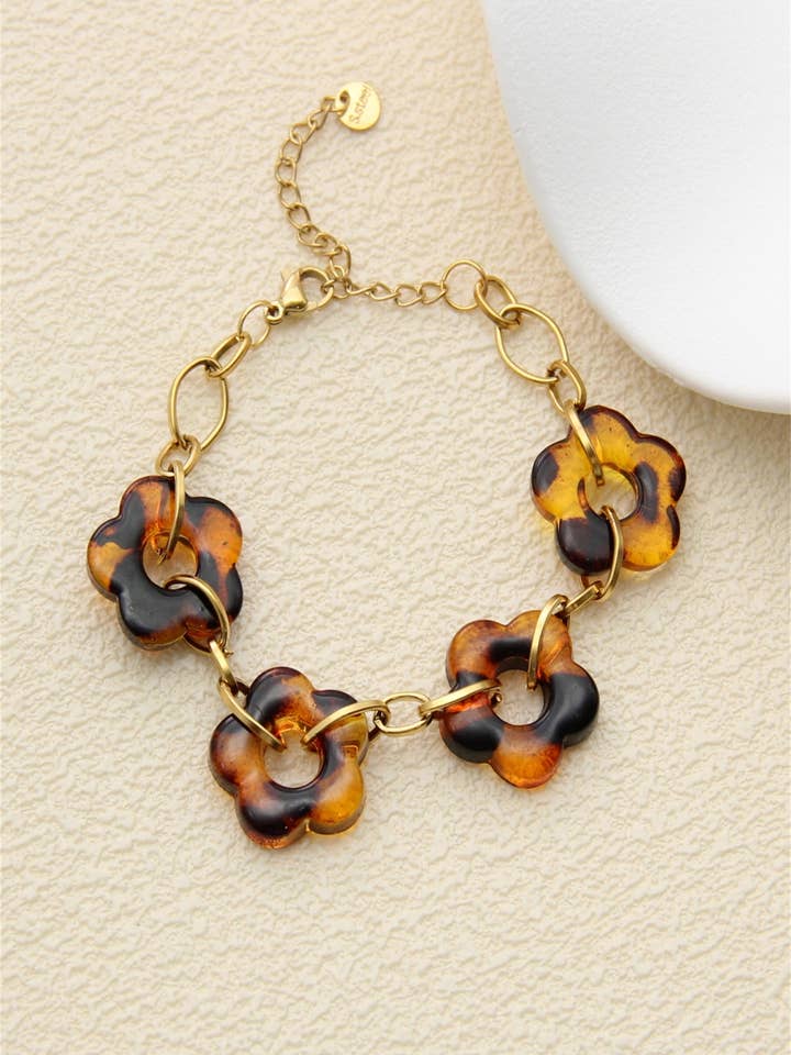 Blomarmband i sköldpaddseffekt-harts och rostfritt stålGuld för wholesale av BELLISSIMA BIJOUX