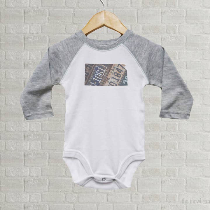 Kansas Baby Onesie | Romper | Vintage License Plate Art for wholesale by Juniper & Spruce