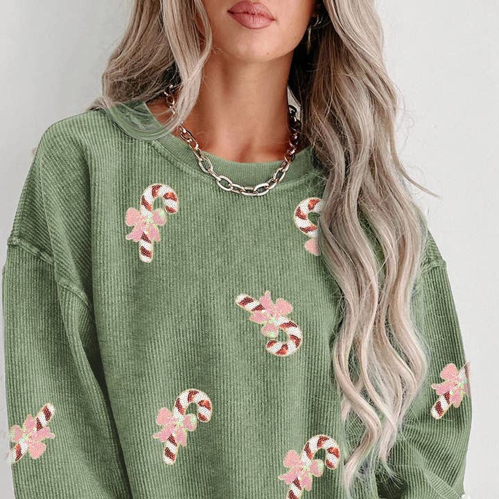 Grass Green Christmas Sequin Candy Cane Patched Corded Ribbed Baggy Sweatshirt and other Purchase Wholesale green candy canes. Free Returns & Net 60 Terms on Faire trending on Faire.