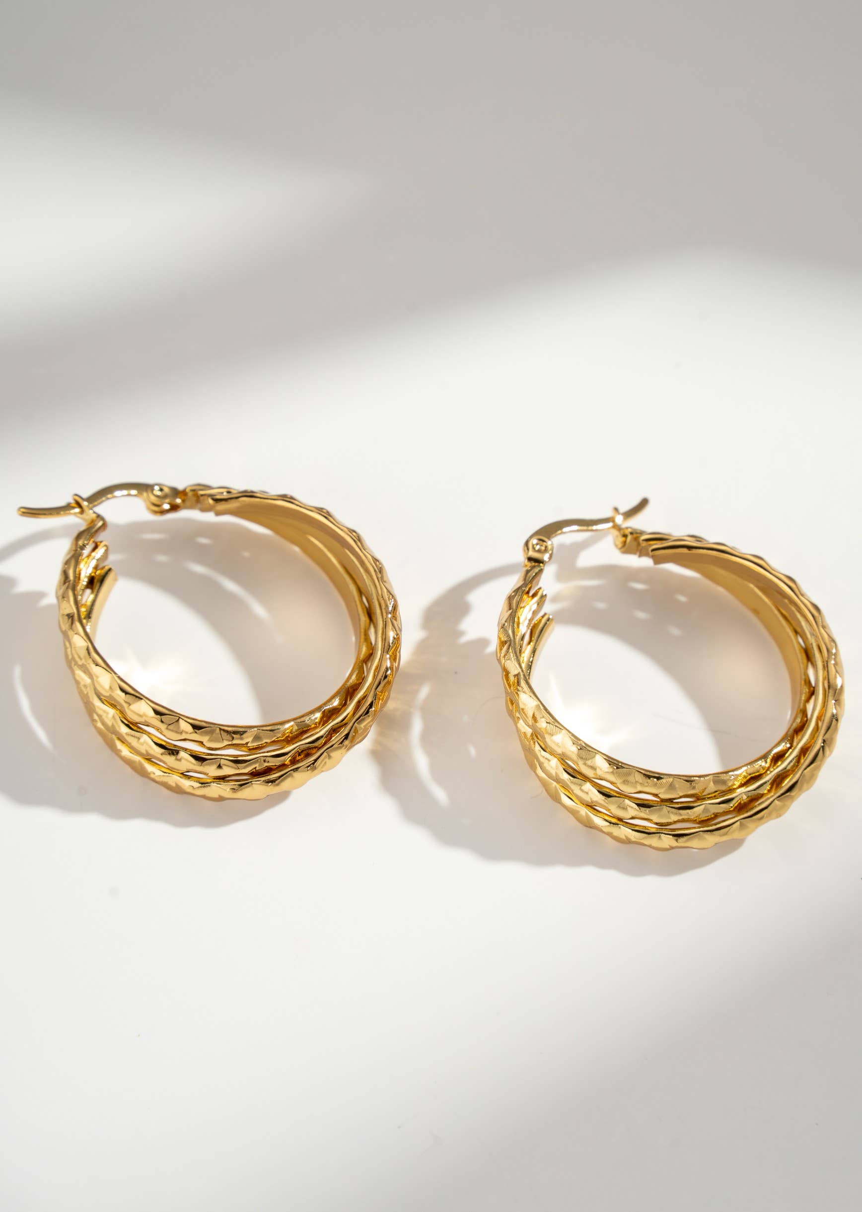 COSMOS - Wholesale Hoop Earrings - Hammered golden stainless steel creoles for women chic evening