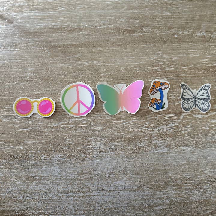 Tillfälliga tatueringar med groovy/hippietema för wholesale av kierst